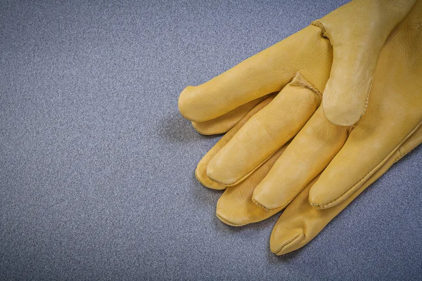 Gele beschermende handschoenen — Stockfoto