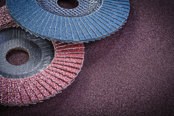 Abrasive flap wheels on sandpaper  