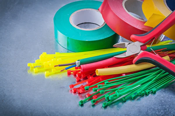 Insulating tapes plastic cable ties — Stock Photo, Image
