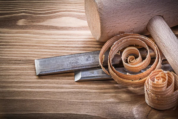 Curled shavings on vintage wood board — Stock Photo, Image