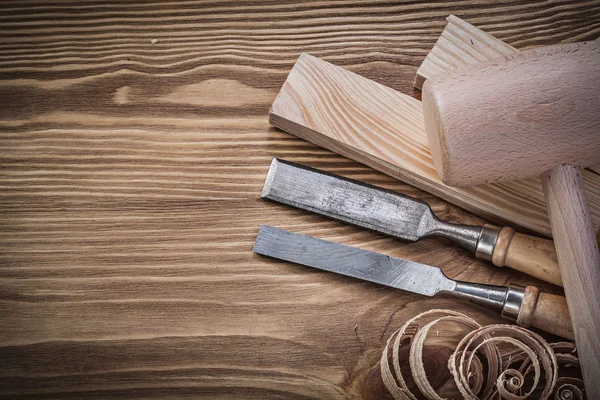 Wooden hammer on vintage board — Stock Photo, Image