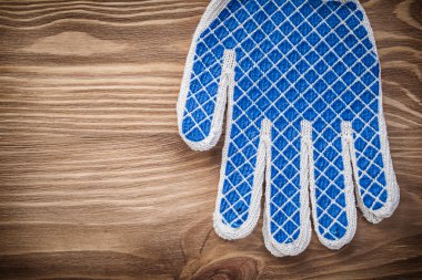 Emanet çalışma eldivenleri ahşap Pano bakım kavramı