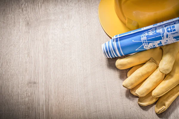 Προστατευτικά γάντια δέρματος σκληρό καπέλο μπλε κατασκευαστικών σχεδίων σε — Φωτογραφία Αρχείου