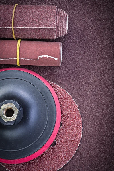 Glass-paper rolls sanding discs on polishing sheet abrasive equi — Stock Photo, Image