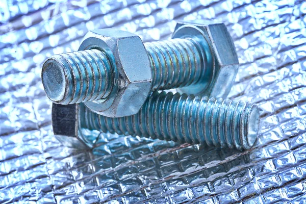 Stainless bolt details and screw nut on metal background constru — Stock Photo, Image