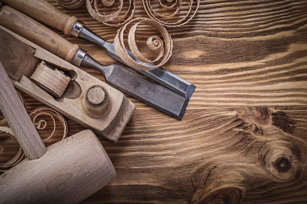 Cáscaras, plano de afeitado y martillo de bulto — Foto de Stock