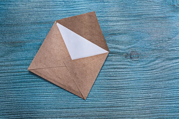 Vintage post envelope with message on wooden board — Stock Photo, Image