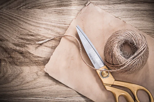 Vintage paper and golden scissors — Stock Photo, Image