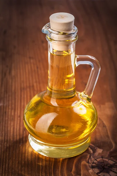 Small bottle with sunflower oil — Stock Photo, Image