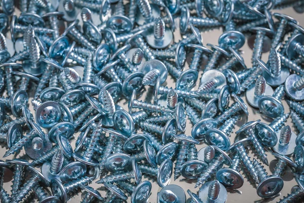 Small galvanized screws — Stock Photo, Image