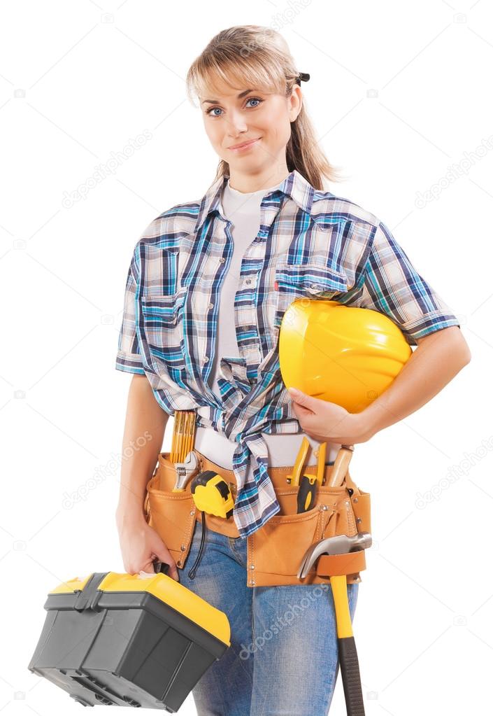 beautiful young female construction contractor with tools isolat