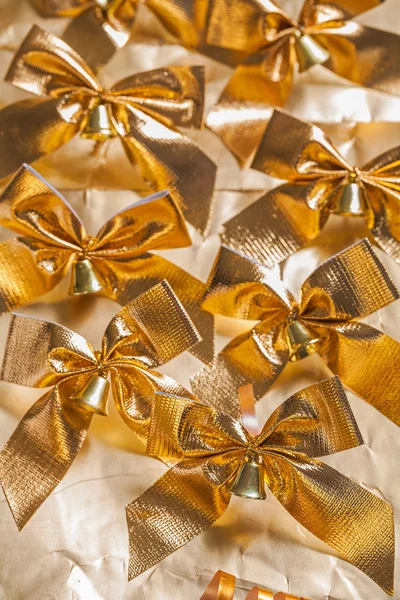 Golden christmas bows — Stock Photo, Image