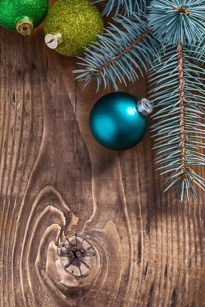 Green yellow and blue christmas baubles — Stock Photo, Image