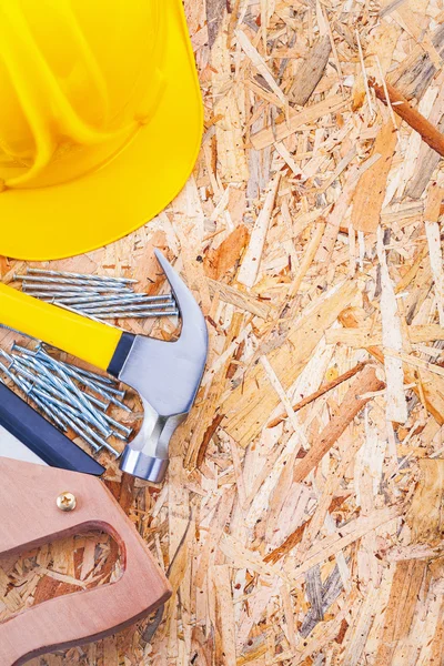 Handsaw claw hammer and nails — Stock Photo, Image