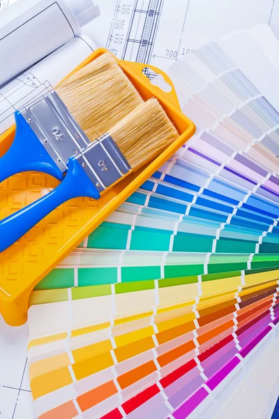 Paintbrushes  on color palette — Stock Photo, Image