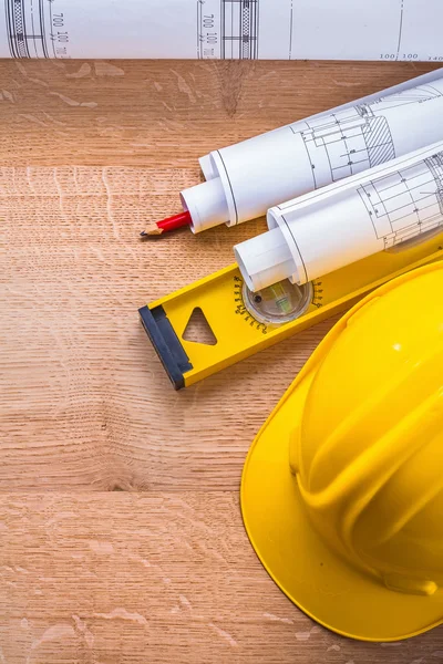 Construction concept with yellow hardhat — Stock Photo, Image