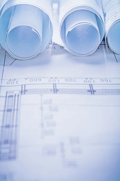 Rolls of blueprints background — Stock Photo, Image