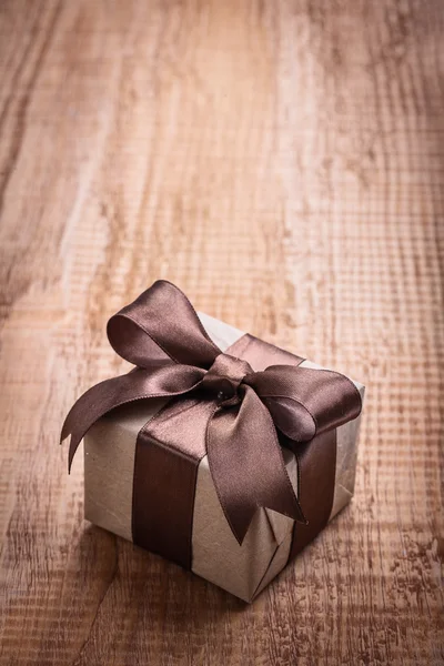Vintage gift box with brown bow — Stock Photo, Image