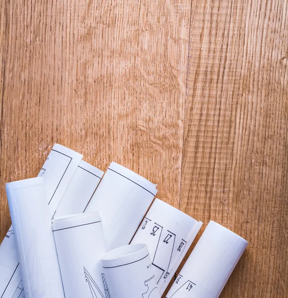 Stack of white rolled up blueprints — Stock Photo, Image