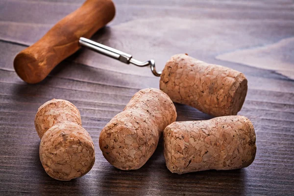 Corks of chmapagne and corkscrew — Stock Photo, Image