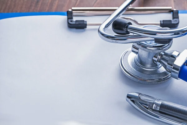 Stethoscope and ballpoint pen — Stock Photo, Image