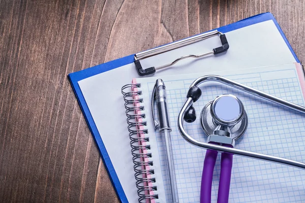 Stethoscope with purple tubes — Stock Photo, Image