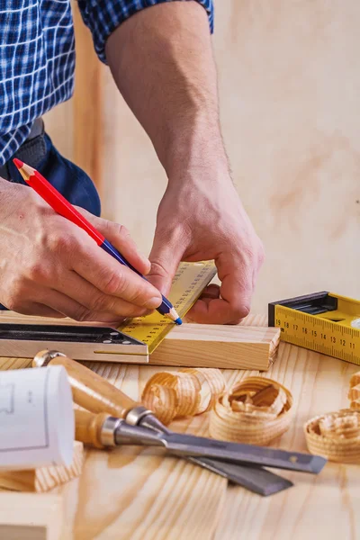 Carpenter drawing with pencil — Stock Photo, Image