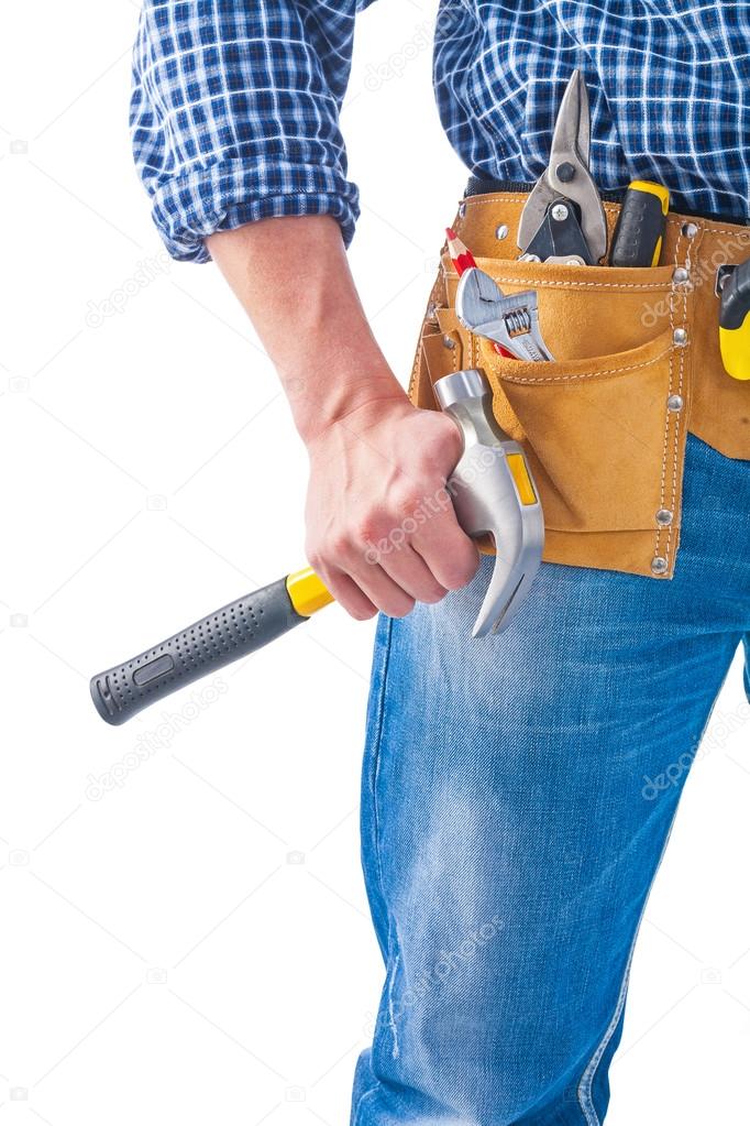 Carpenter holding claw hammer