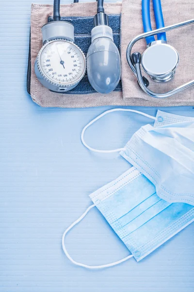 Stethoscope blood pressure monitor masks — Stock Photo, Image