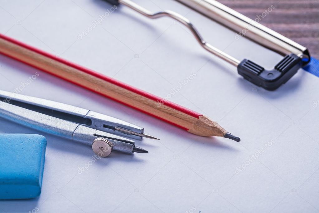 Pencil, eraser, compass and clipboard — Stock Photo © mihalec 69015997