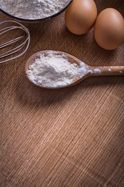 Eggs on vintage wooden board — Stock Photo, Image