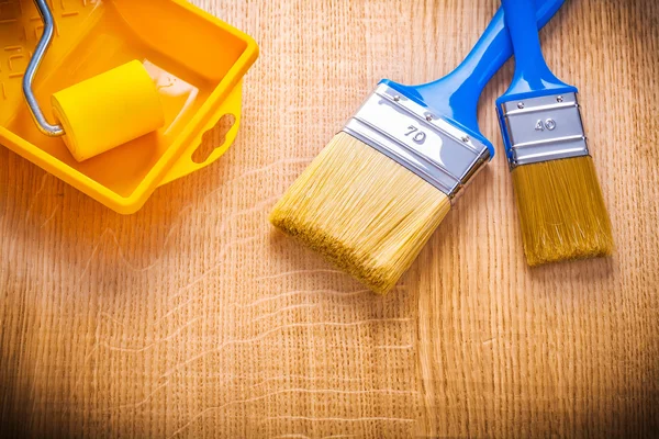 Two paint brushes and tray — Stock Photo, Image