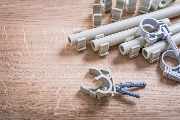 Polypropylene Fixators And  Pipe  With Clips — Stock Photo, Image