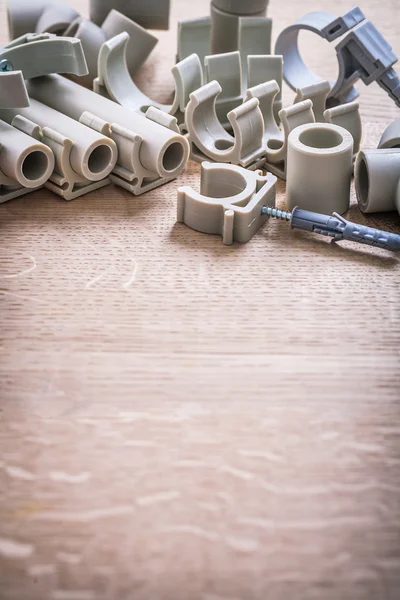 Polypropylene Fixators And  Pipe  With Clips — Stock Photo, Image