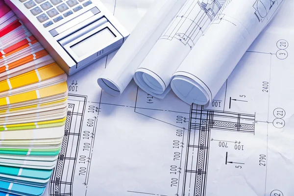 White rolled blueprints — Stock Photo, Image