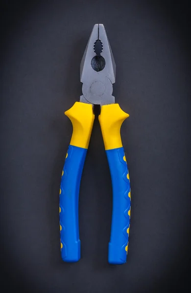 Pliers with blue handles — Stock Photo, Image