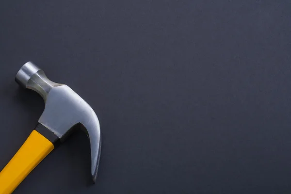 Klo hammare med gult handtag — Stockfoto
