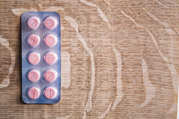 Blister pack with rose medical pills — Stock Photo, Image