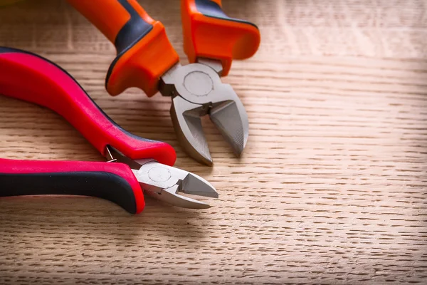 Two nippers with red handles — Stock Photo, Image