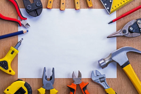 Set of tools with blank paper — Stock Photo, Image