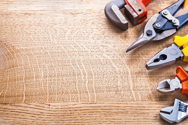 Set of tools on wooden board