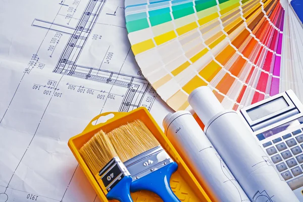 Set of painting tools with blueprints — Stock Photo, Image