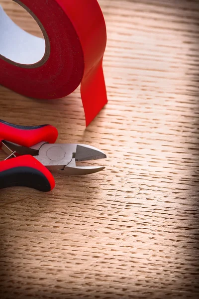 Nippers with insulating tape — Stock Photo, Image