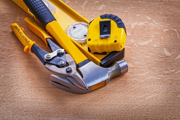 Cutting pliers claw hammer construction level — Stock Photo, Image