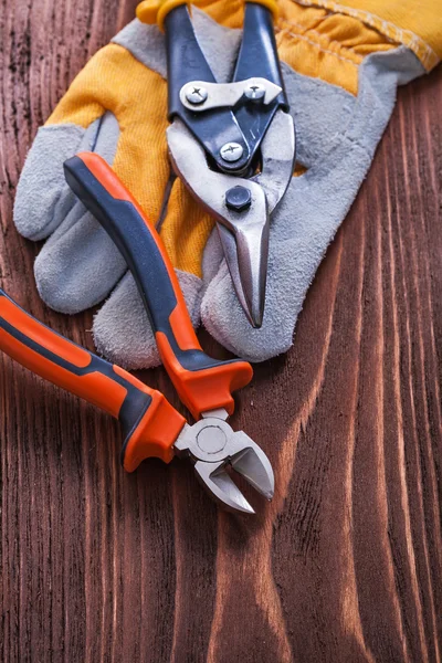 Nippers, cutting pliers with  glove — Stock Photo, Image