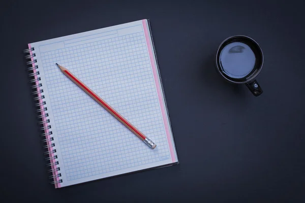 Squared workbook pencil and coffee — Stock Photo, Image