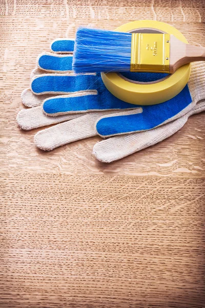 Household tape, paint brush, gloves — Stock Photo, Image