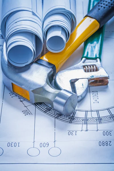 Blueprint, adjustable spanner and claw hammer — Stock Photo, Image