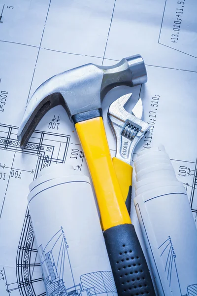 Hammer, construction plans, adjustable spanner — Stock Photo, Image