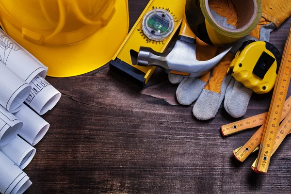 Desenhos de construção e conjunto de ferramentas de construção — Fotografia de Stock